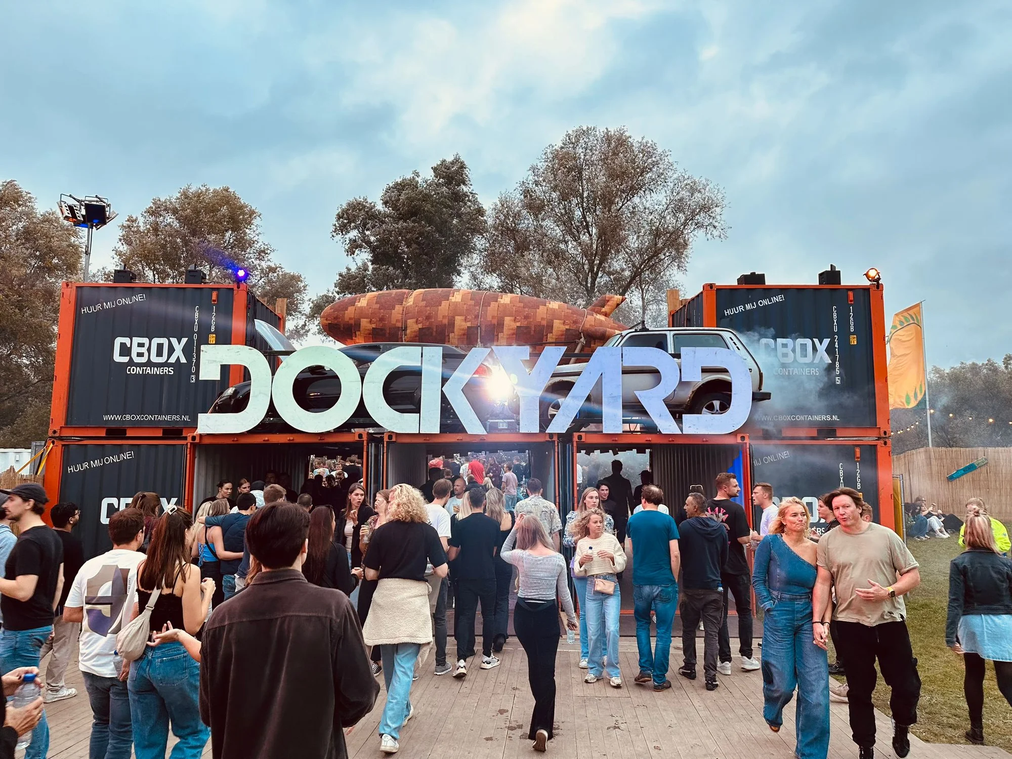 Stacked CBOX event containers incorporated into the Dockyard festival entrance and event design